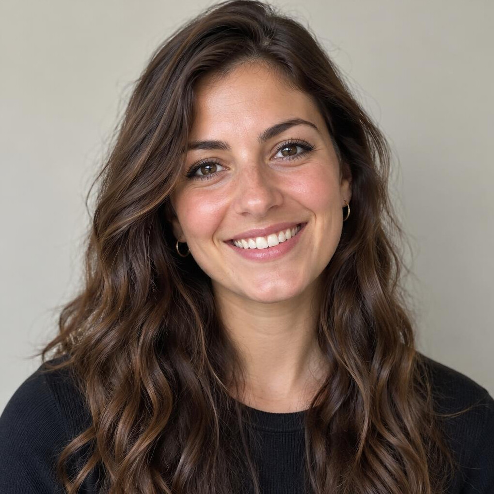 Portrait of a smiling young woman with long hair